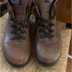 Vasque Brown and Black Boots with High-Top Design and Durable Sole